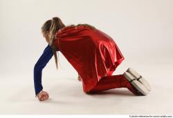 VIKY SUPERGIRL KNEELING POSE 2